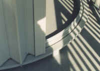 Mechanically Bent Radius Tracks for Accordion Shutters